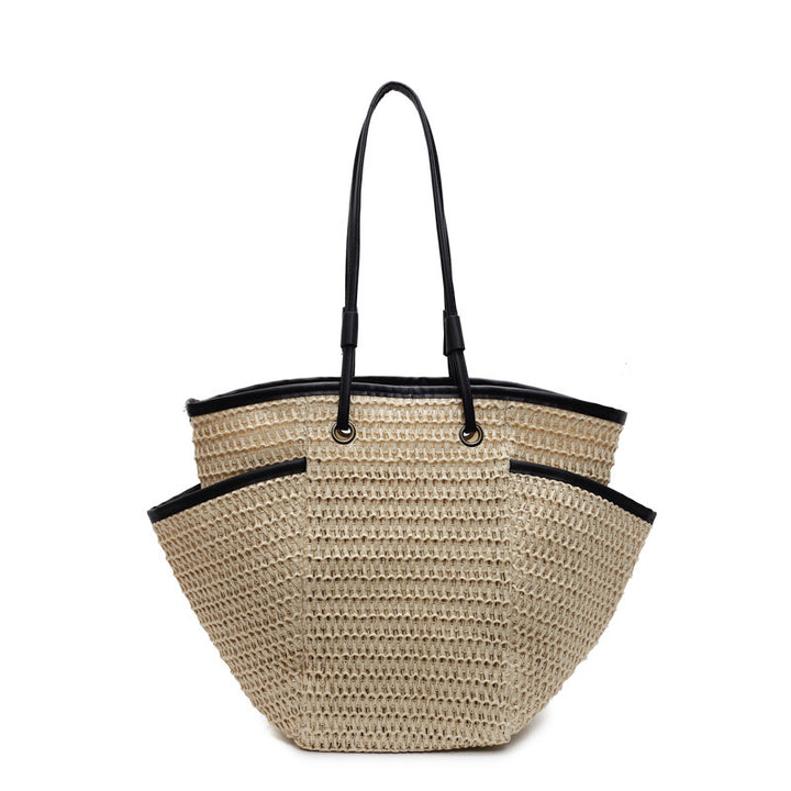 Romslig bast-handletote med elegante lær-detaljer Skanto