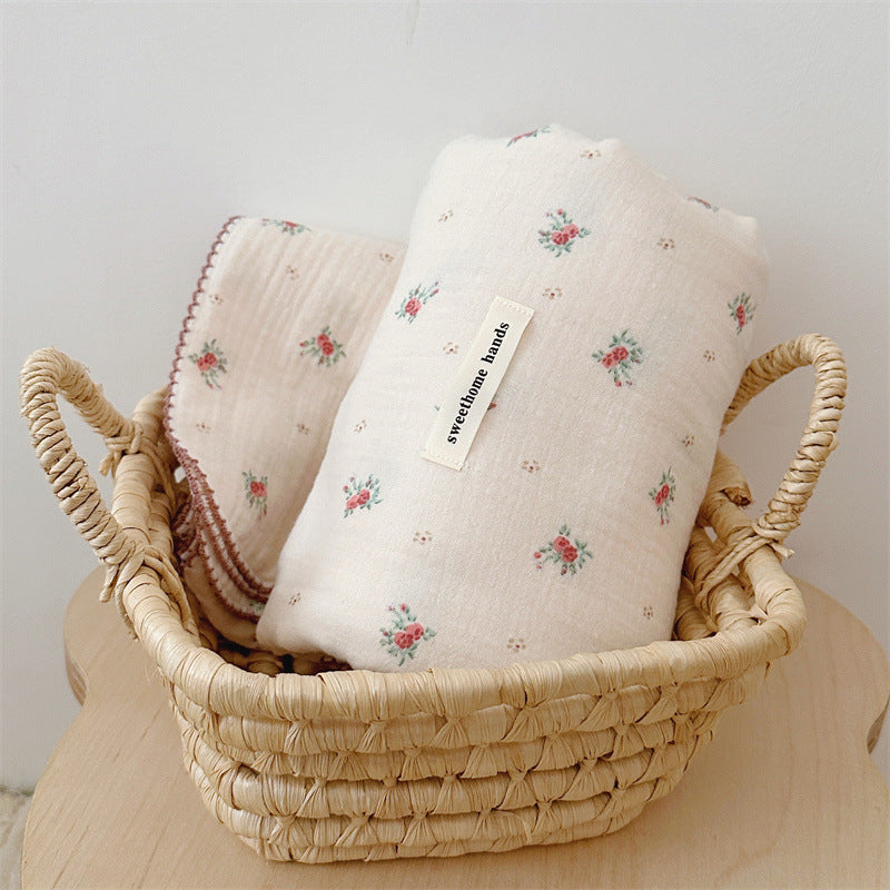 Unisex koselig muslinteppe med elegant blomstermønster Skanto