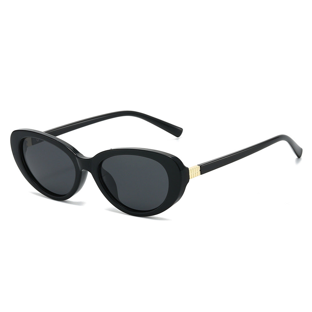 Damer moter solbrille i elegant Cat-Eye-stil Skanto