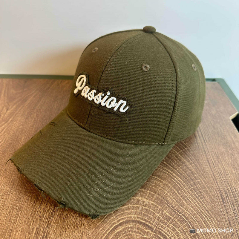 Kvinnes slitt bomull baseballcap med brodert sitat Skanto