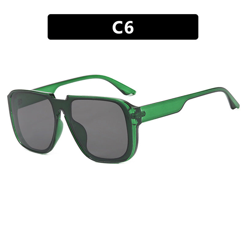 Dame trendy firkantet solbrille med gjennomsiktig, grønn ramme og beskyttende UV-filter Skanto