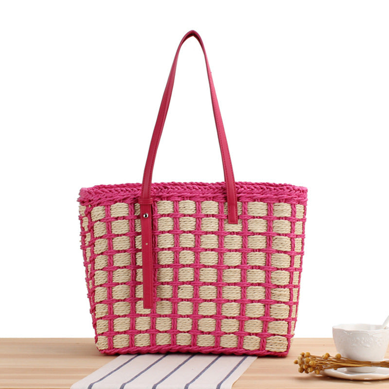 Hand-knotted tote bag in natural material with elegant leather handles Skanto