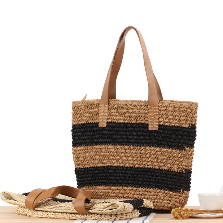 Wide straw bag with elegant leather handles Skanto