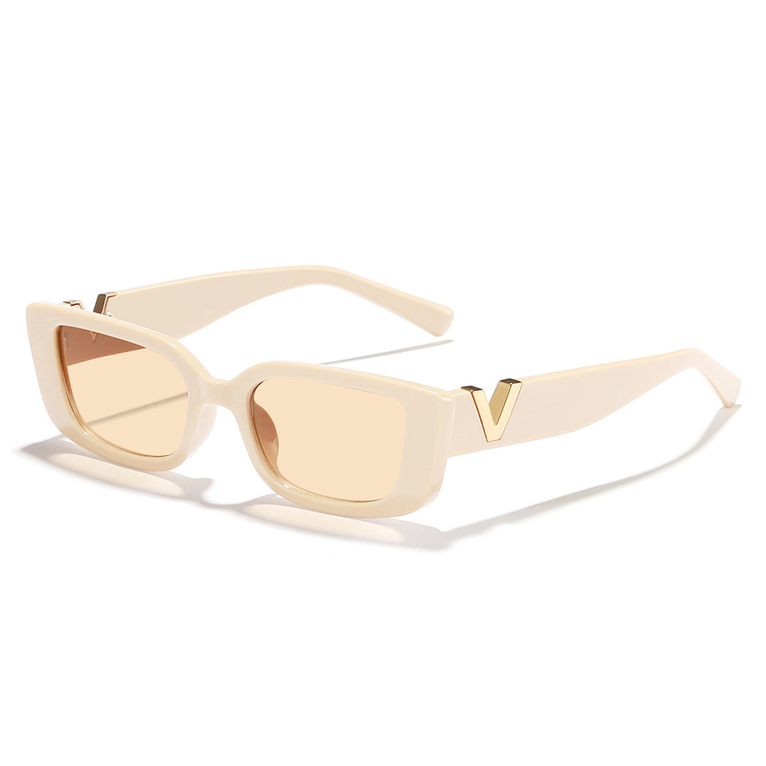 Dame moteriktig kvadratisk solbrille med gullbekledning Skanto