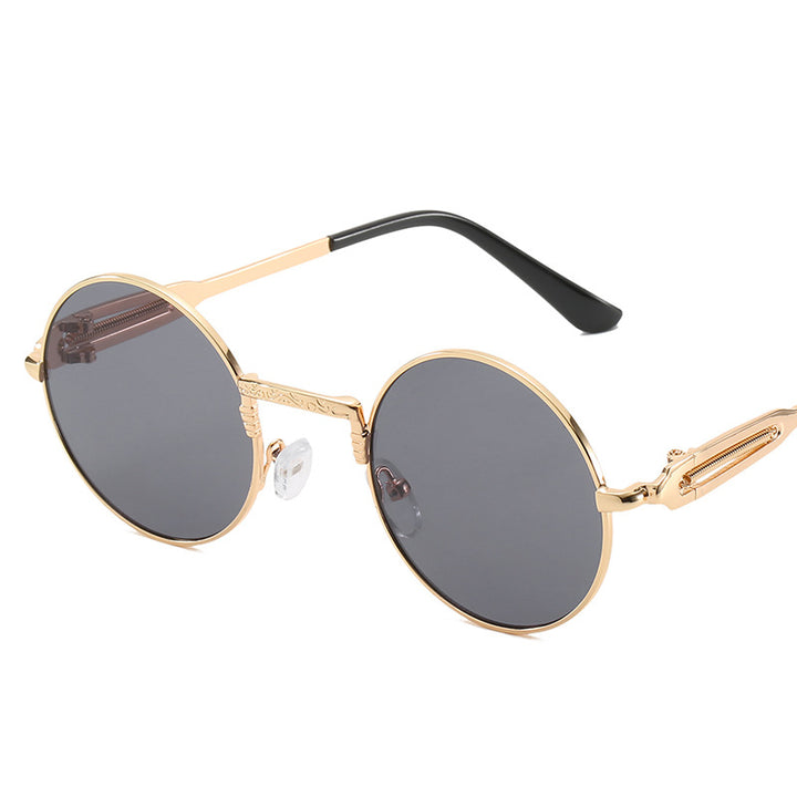 Dame rund modisk solbrille med fint metallramme Skanto