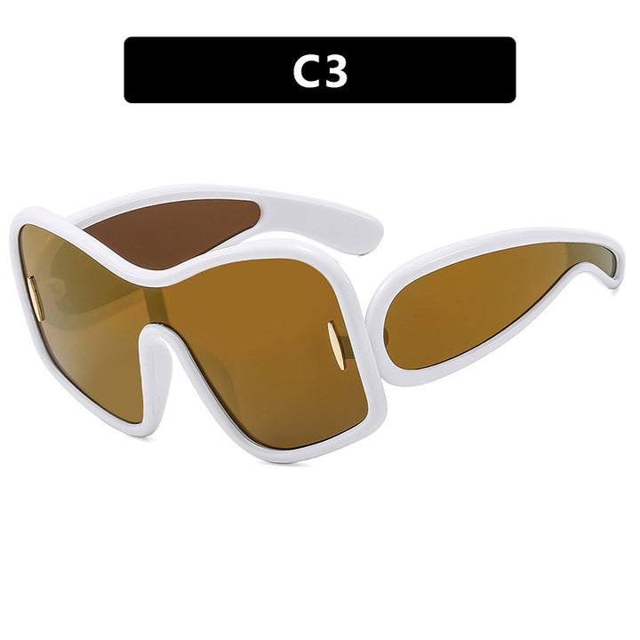 Dame futuristisk solbrille med ekstra bred design og beskyttende UV-filter Skanto