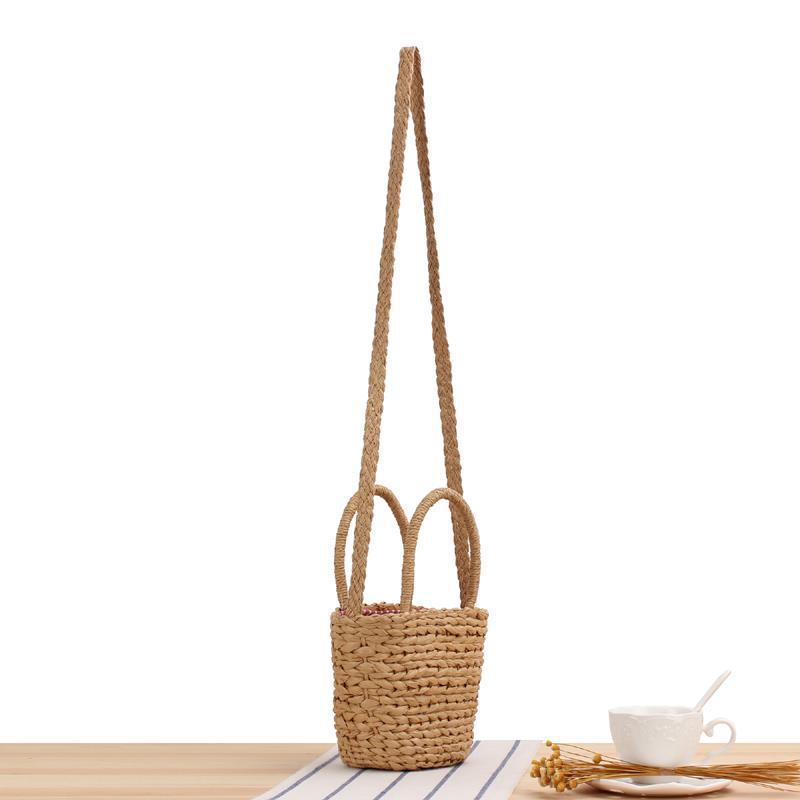 Umhengerbag av flettet naturmateriale Skanto
