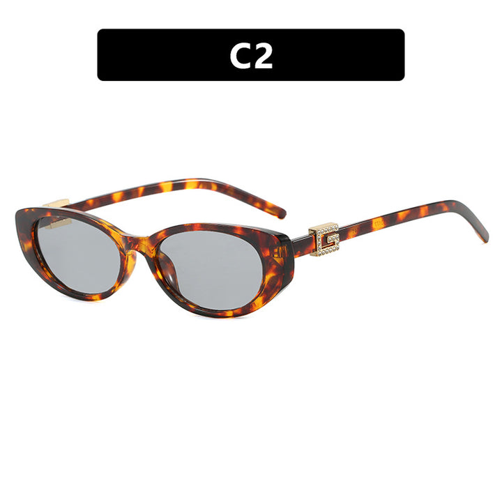 Damer cat-eye solbrille med elegant metallramme og beskyttende UV-filter Skanto