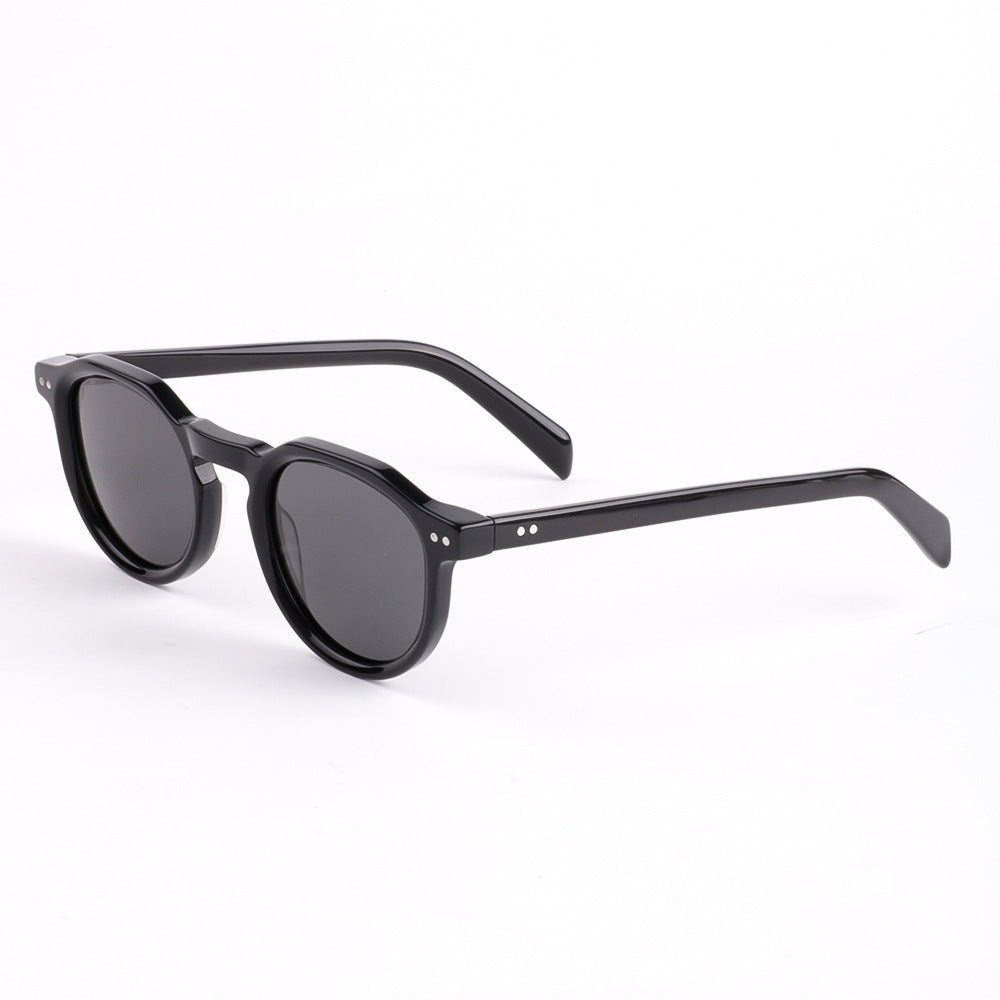 Dame stilige solbriller med stilfull, rund ramme og UV-beskyttelse Skanto