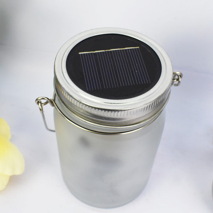 Solar Powered Frosted Fairy Silhouette Mason Jar Lantern with Multicolor LED Skanto
