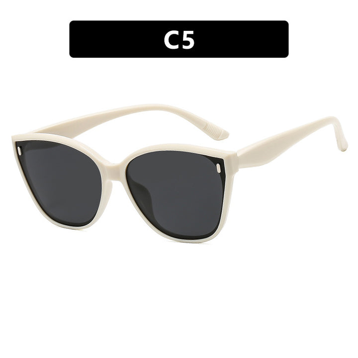 Dame Cat-Eye solbriller med beskyttende UV-filter og stilfull ramme Skanto
