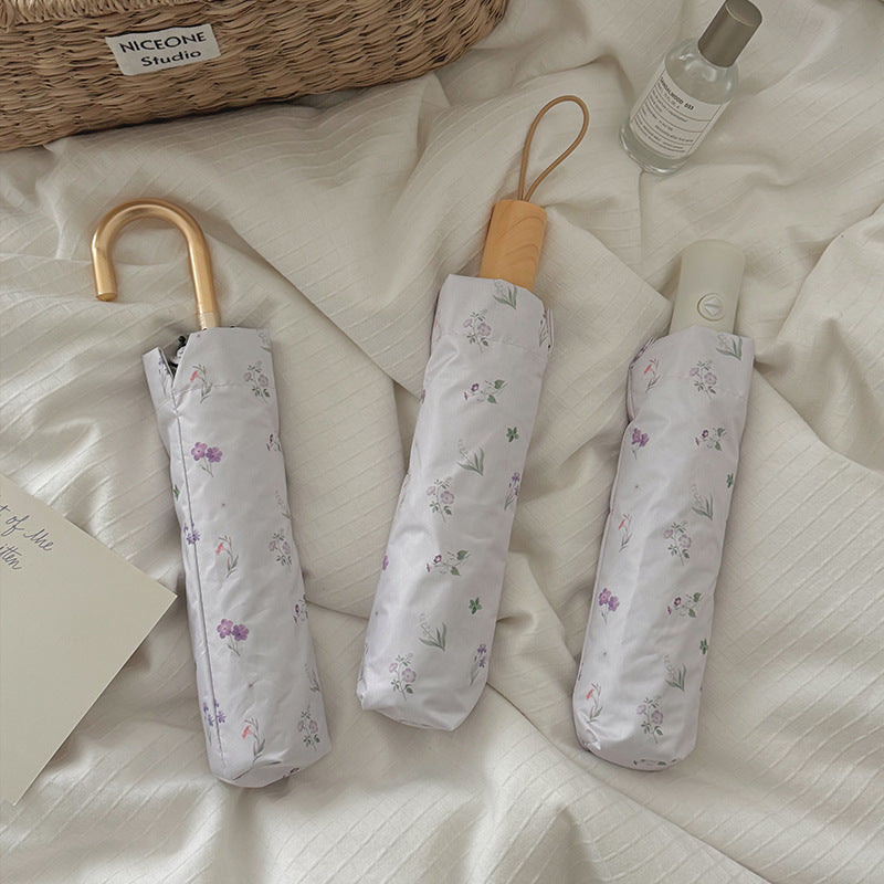 Damer Sammenleggbar Paraply med elegant blomstermønster Skanto