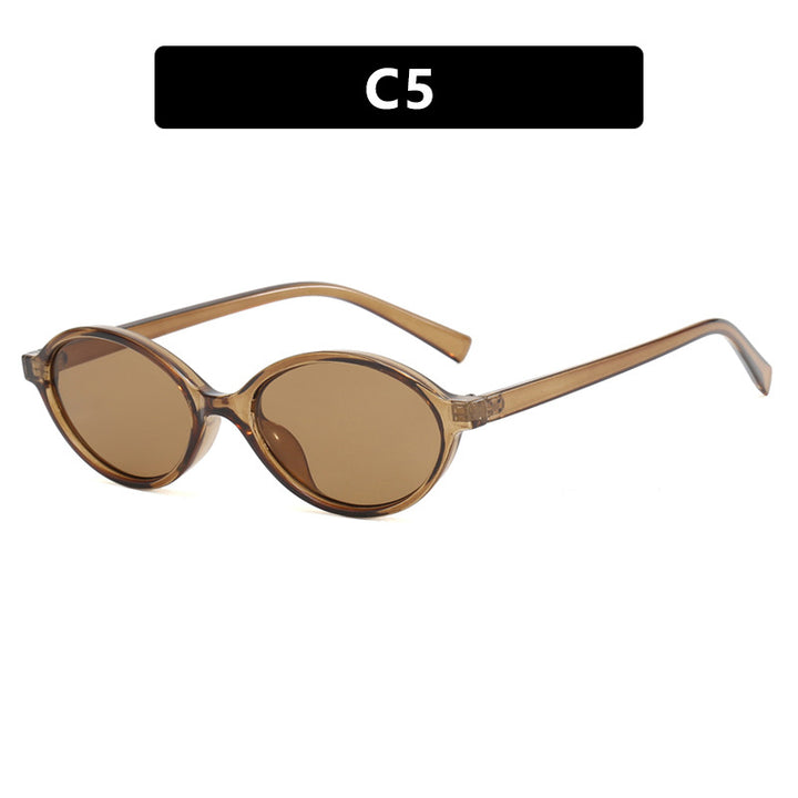 Dame moteriktig oval solbrille med buet ramme og UV-beskyttelse Skanto