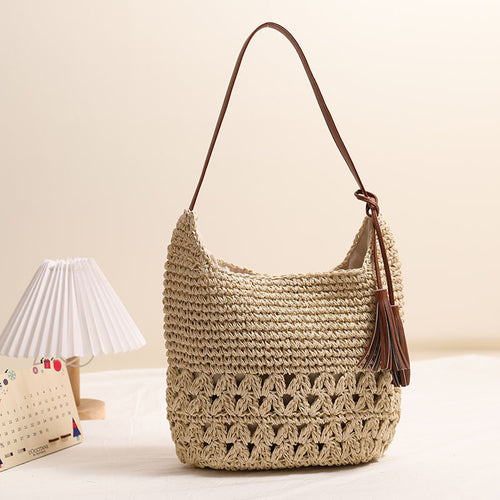 Håndlaget skulderveske laget av flettet naturmateriale Skanto