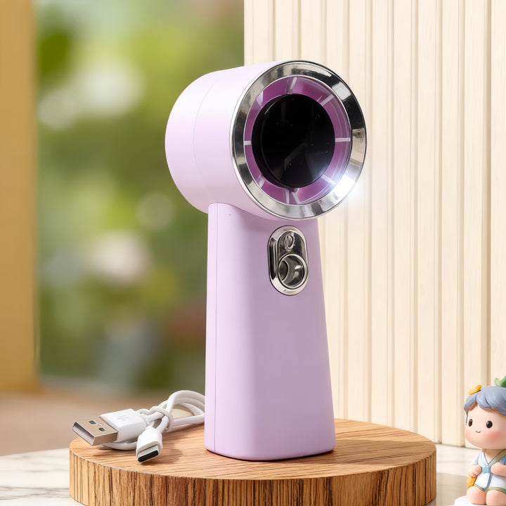 Dame bærbar mini sprayvifte med ergonomisk design Skanto