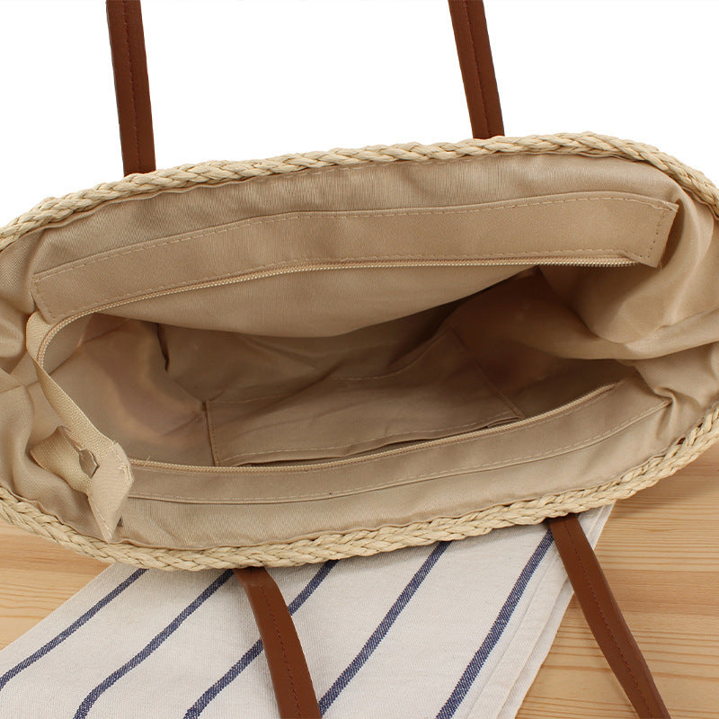 Modern straw bag with leather details Skanto