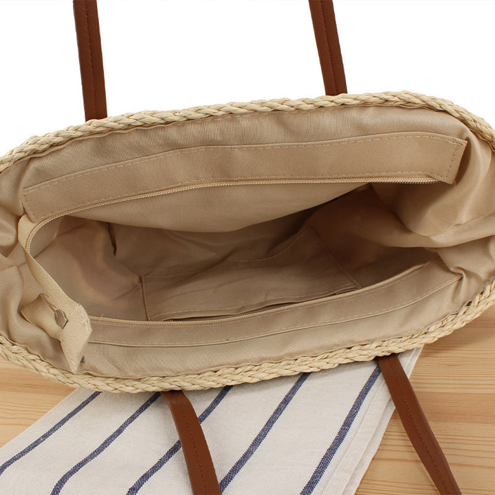 Modern straw bag with leather details Skanto