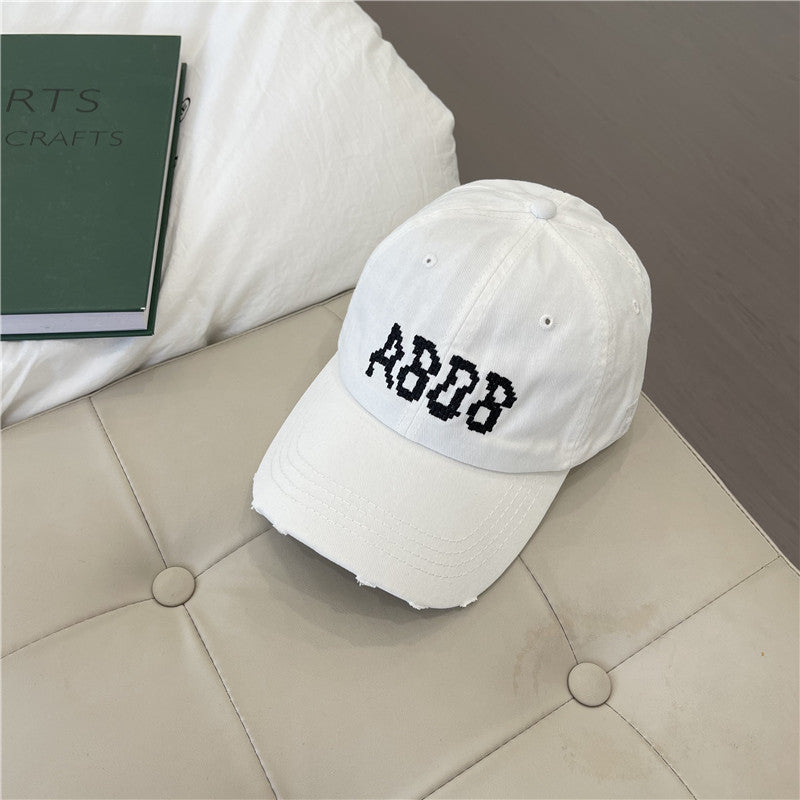 Kvinnens slitte bomull baseballcaps med grafisk detaljer Skanto
