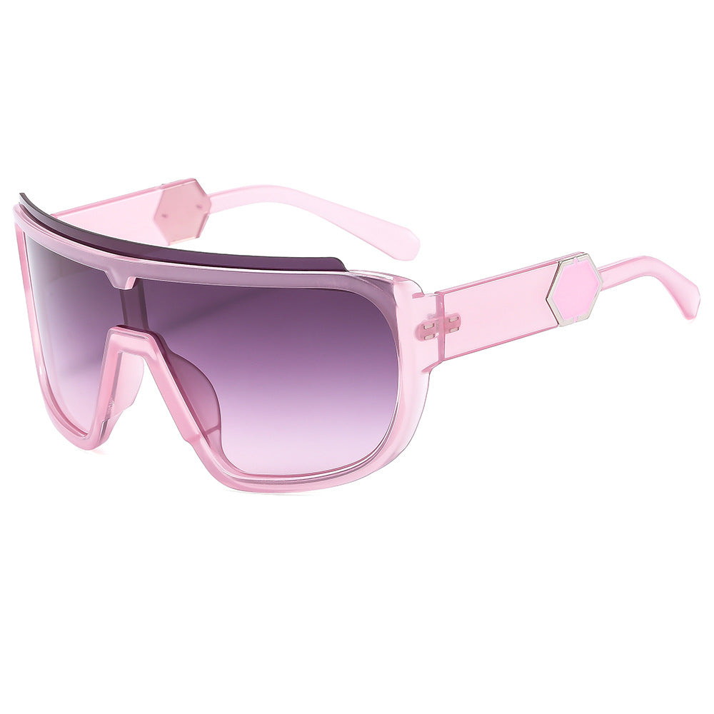 Dame sporty solbriller med futuristisk design og bred front Skanto