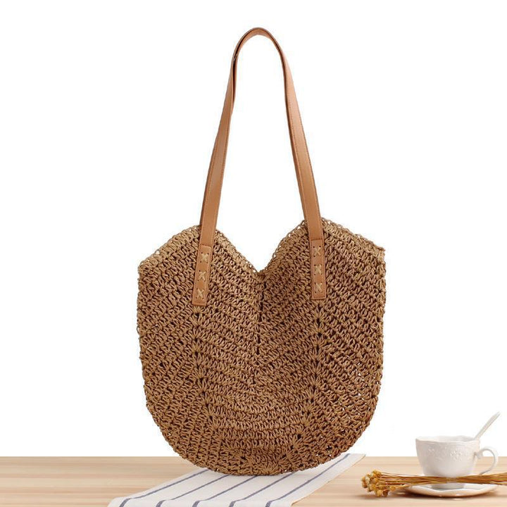 Large straw bag with leather accents Skanto