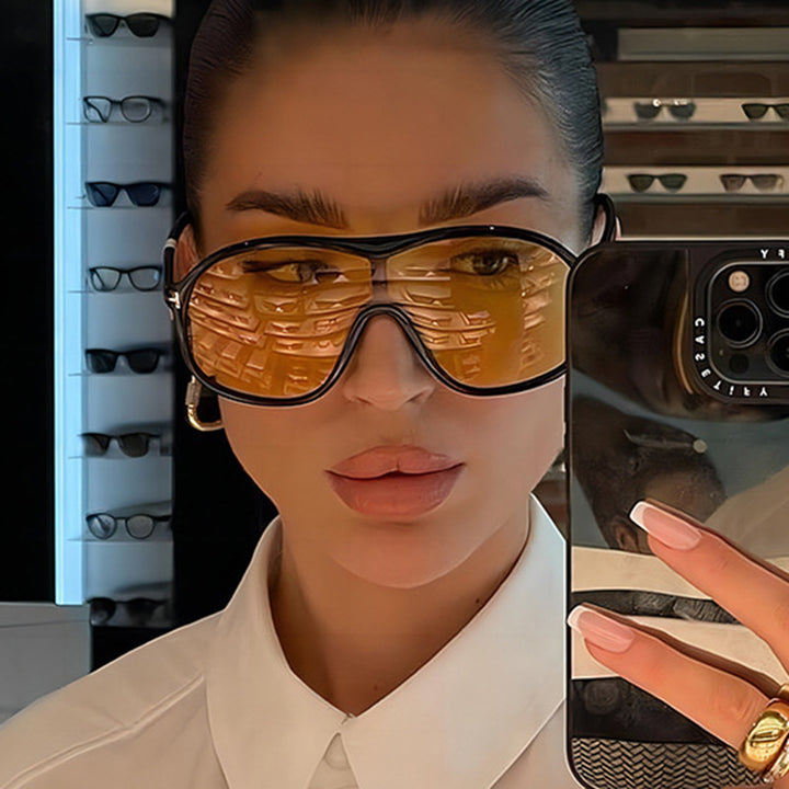 Dame moteriktig oversized solbrille med innovativt design Skanto