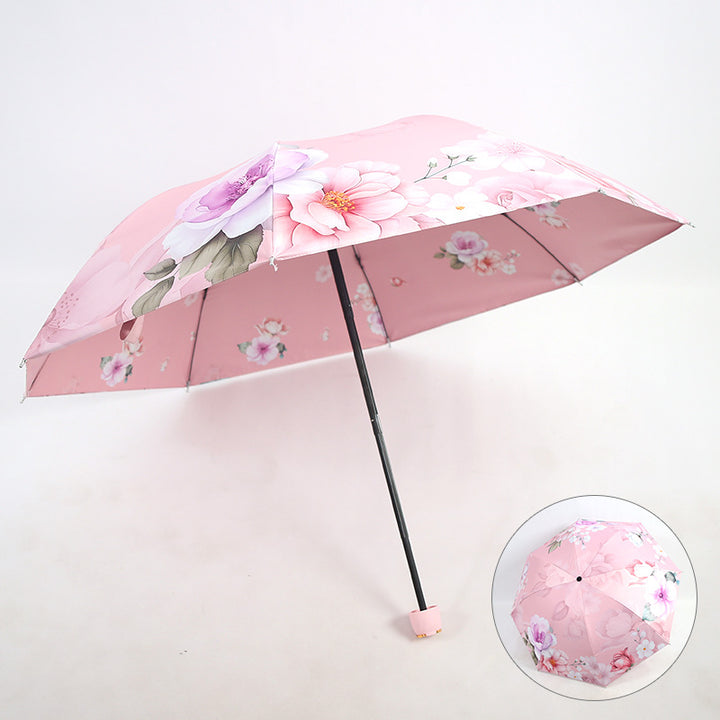Kvinnes elegant sammenleggbare paraply med blomsterdesign Skanto