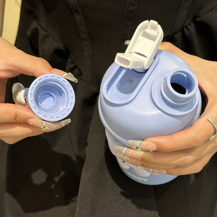 Damen isolierte Wasserflasche mit ergonomischem Tragegriff und fröhlichem Motiv Skanto