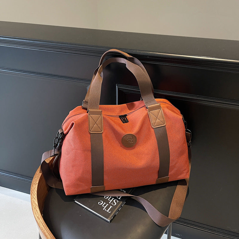 Sporty Duffel Bag With Multiple Compartments And Adjustable Shoulder Strap Skanto