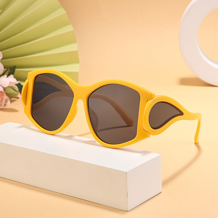 Dame moderne Cat-Eye solbriller med unikt ramme og UV-beskyttelse Skanto
