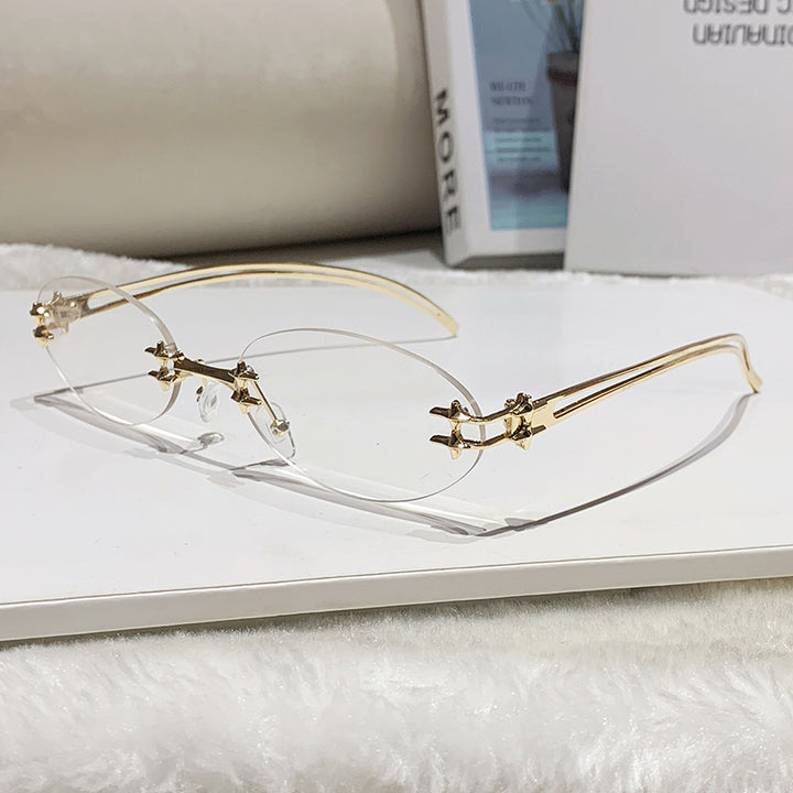 Dame elegant metallbrille med filigran design Skanto