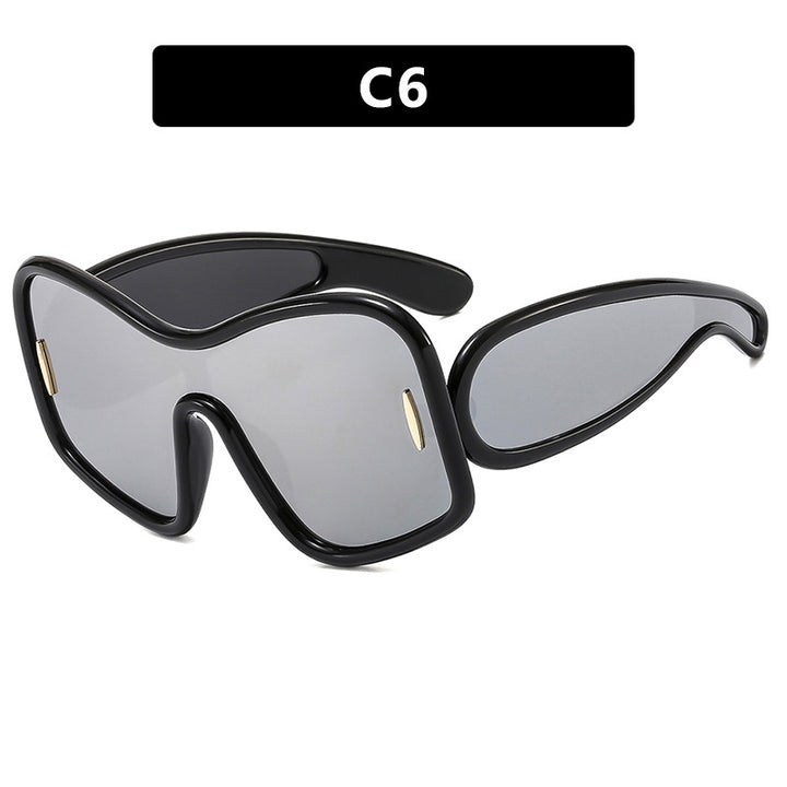 Dame futuristisk solbrille med ekstra bred design og beskyttende UV-filter Skanto