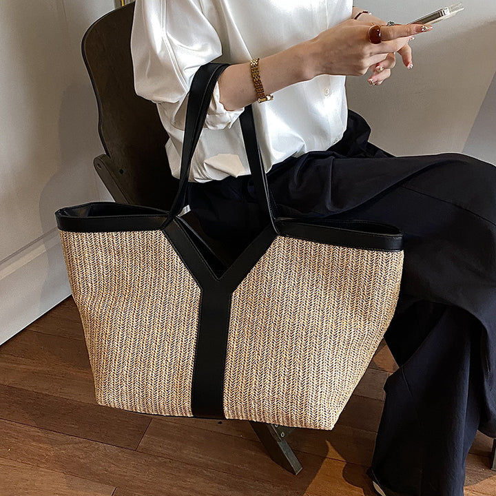 Generøs og stilfull handledagsekk Skanto