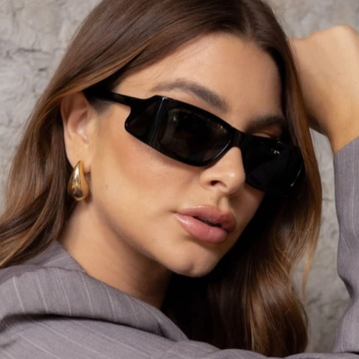 Damer ekstravagante solbrille i geometrisk design Skanto