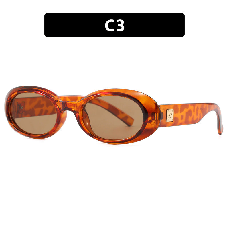 Dame eksklusiv solbrille i elegant ovalt design Skanto