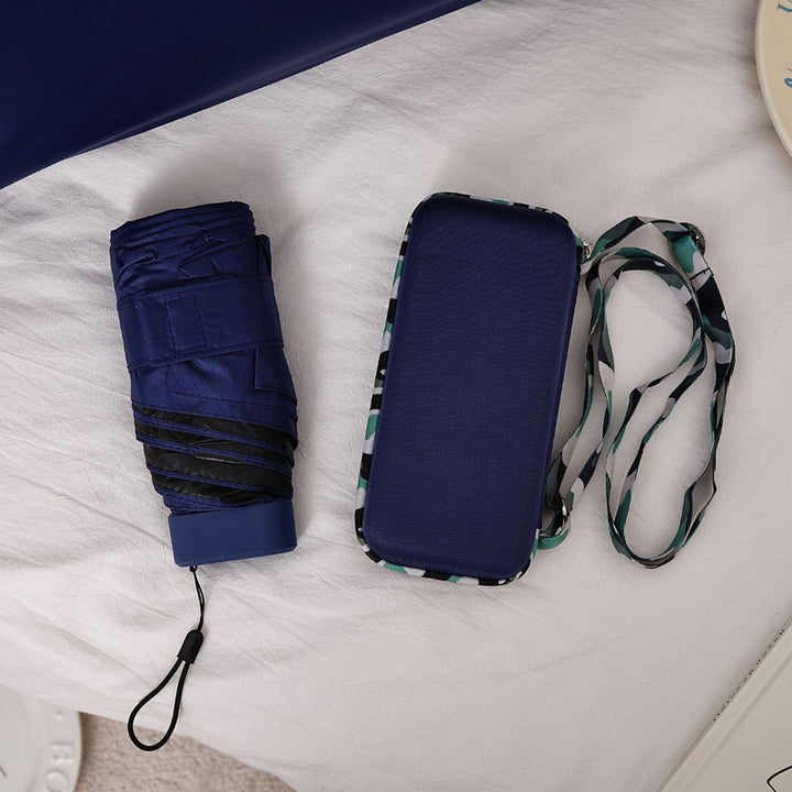 Damer kompakt og elegant sammenleggbar paraply med bæreveske Skanto