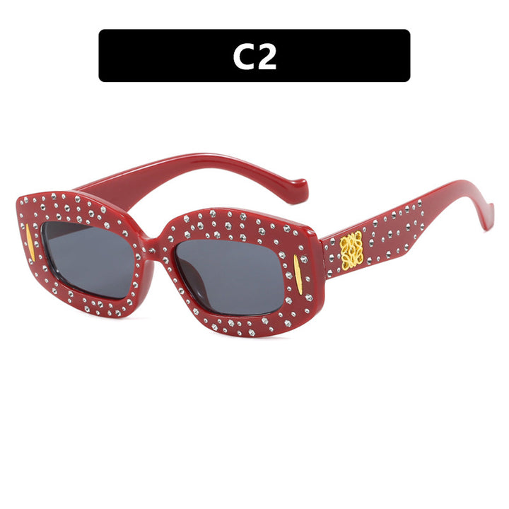 Dame moteriktig solbrille med glamorøs strass-dekor Skanto