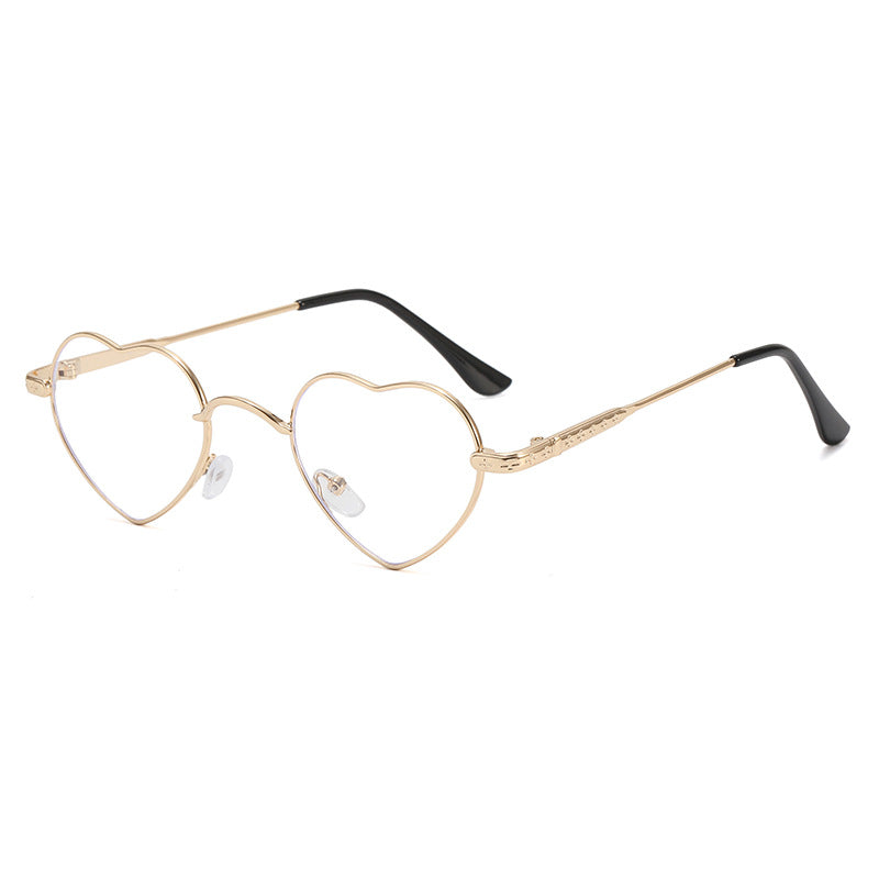 Damer hjerteformet solbrille med filigran metallramme Skanto
