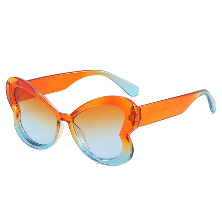 Dame Oversized-solbrille i leken sommerfugl-design Skanto
