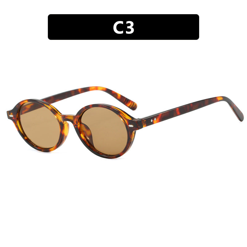 Dame rund solbrille med moderne design og polariserte glass Skanto