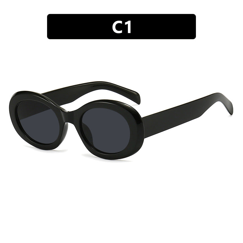 Dame moteriktig solbrille i original oval design med transparent ramme og UV-beskyttelse Skanto