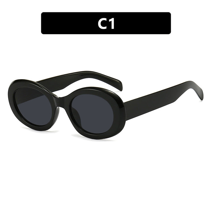 Dame moteriktig solbrille i original oval design med transparent ramme og UV-beskyttelse Skanto