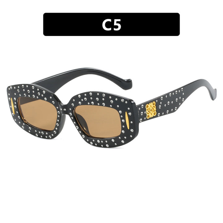 Dame moteriktig solbrille med glamorøs strass-dekor Skanto
