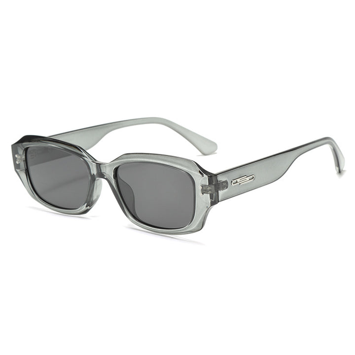 Dame trendy firkantet solbrille med innovativ gjennomsiktig ramme Skanto