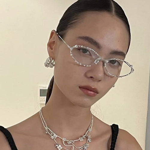 Dame eksklusiv solbrille med glitrende strass-dekor og elegant metallramme Skanto