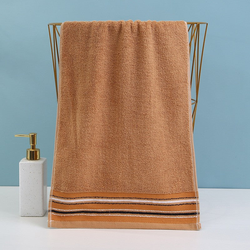 Premium terry towel with elegant stripe border.