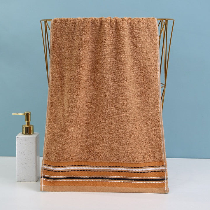 Premium terry towel with elegant stripe border.