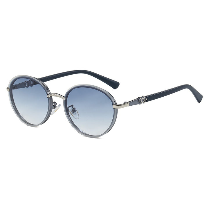 Dame elegant rund solbrille med speilende effekt Skanto