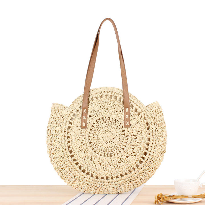 Round straw bag with leather handle Skanto