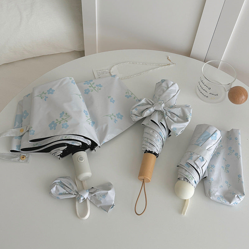 Damer Faltende Paraply med stilfullt blomsterdesign Skanto