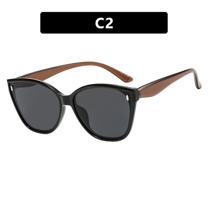 Dame Cat-Eye solbriller med beskyttende UV-filter og stilfull ramme Skanto